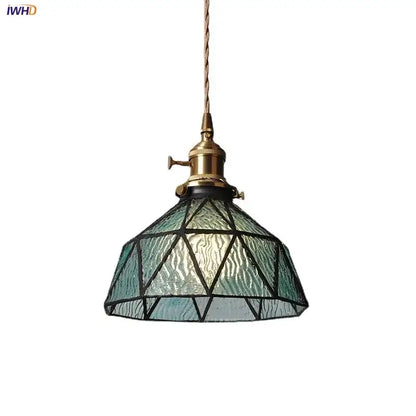 Vintage teal blue glass led pendant light with textured shade, black geometric lines, and brass-finished hardware for kitchen decorbites blue glass lighting