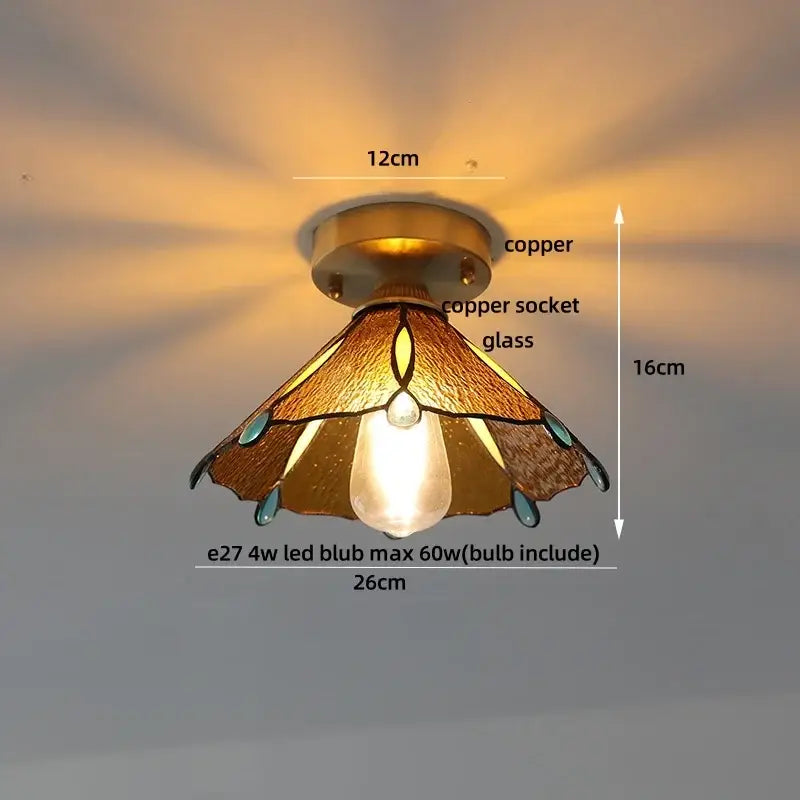 Vintage Tiffany stained glass led ceiling lamp with warm amber panels, copper accents, and brass bedroom fixture