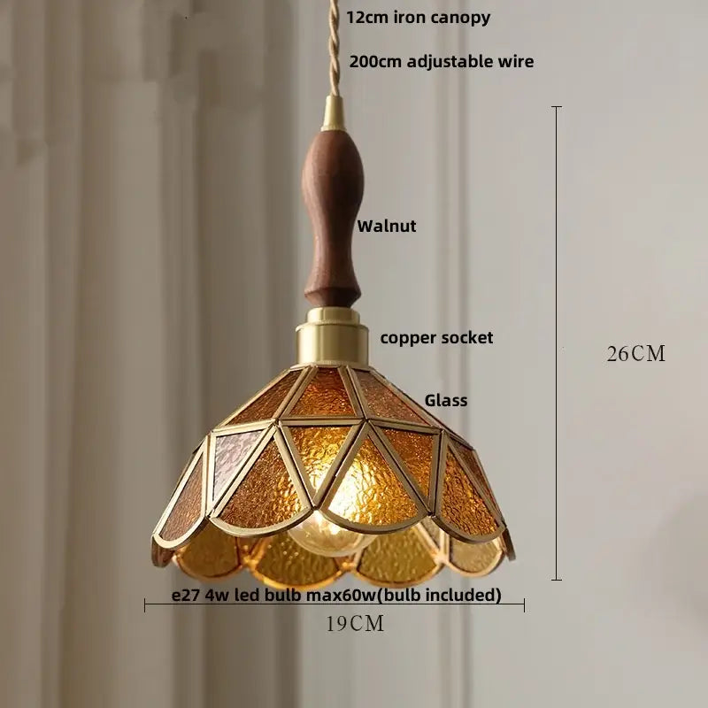 Warm amber-tinted stained glass pendant light with walnut-finished wooden handle and brass accents by decorbites led wood