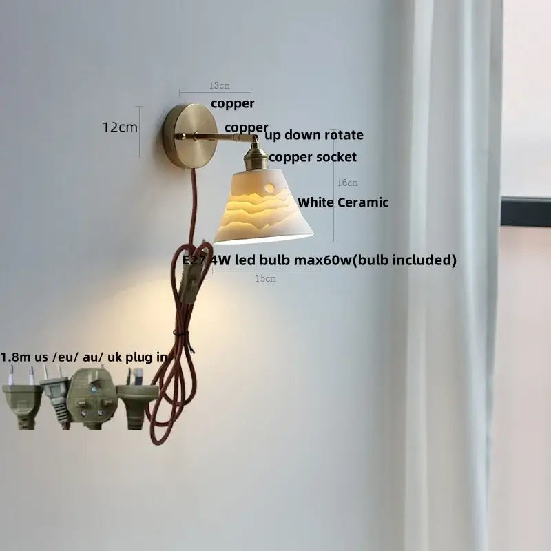 Vintage white ceramic canopy led wall sconce with subtle sun design mounted on copper decorbites ceramic canopy fixture