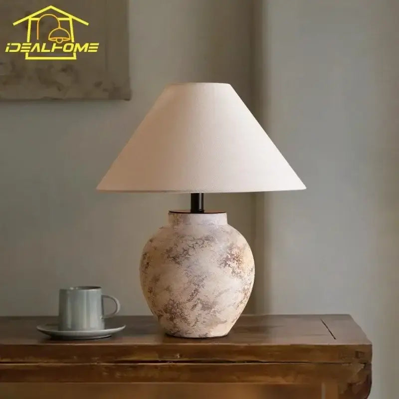 Cream-colored ceramic led table lamp with textured finish and soft white shade for vintage bedroom decorbites ceramic led use