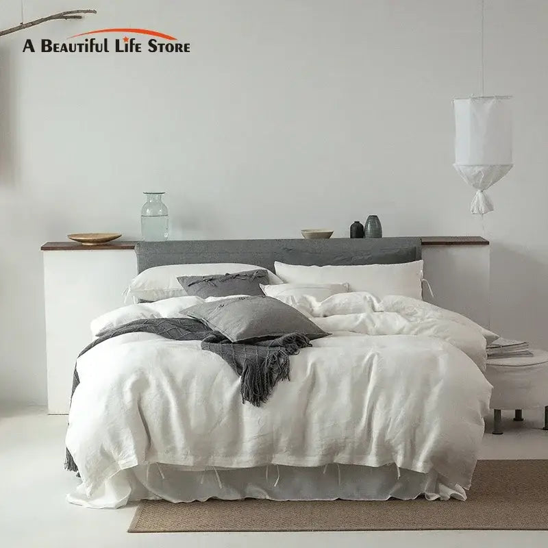 White linen bedding set with gray accent pillows and matching throw blanket vintage linen bedding for bedroom