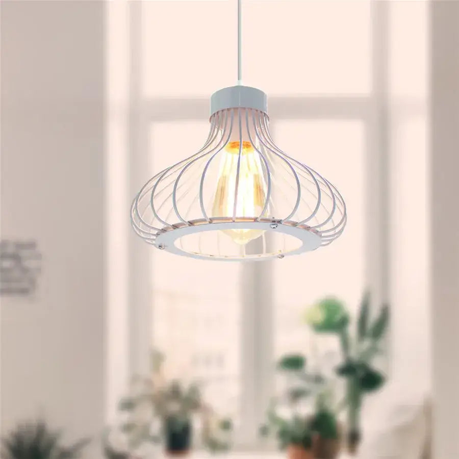 Vintage white metal dome shade loft pendant light with white wire cage and warm glowing bulb for dining room decorbites dome shade