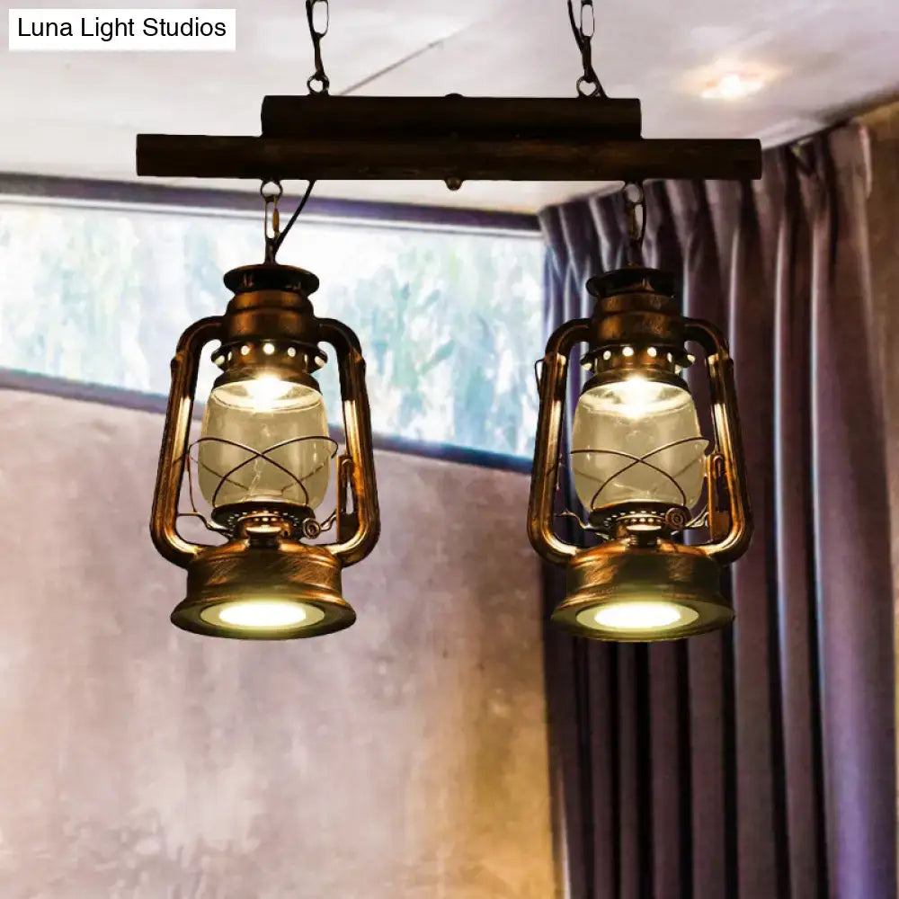 Vintage brass lanterns with clear glass globes hang from a rustic wooden bar in the DecorBites copper lantern island light