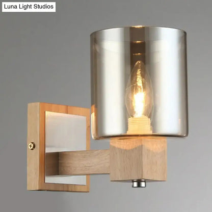 Vintage wood and smoke glass shade wall lamp with cylindrical glass shade and wood wall mount for bedroom sconce
