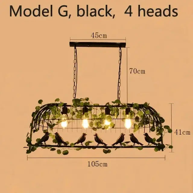 Black metal bird cage chandelier with four bulbs, green vine accents, and bird silhouettes for vintage garden decorbites decor