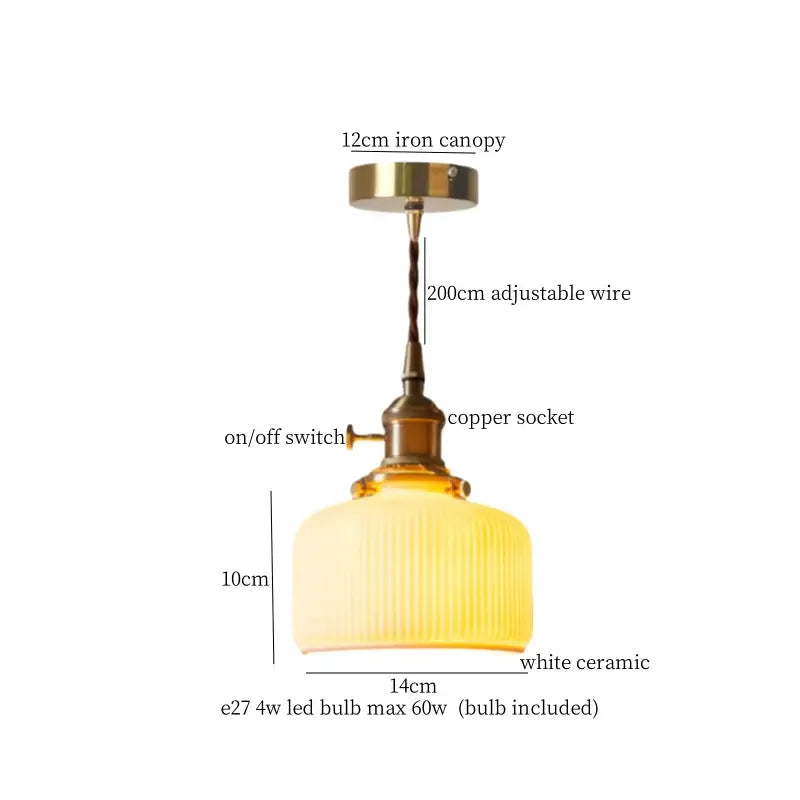A warm white ceramic led pendant light with ribbed texture and brass details, ideal for kitchen dining room use