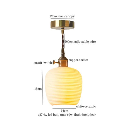 A warm white ceramic led pendant light with ribbed texture and brass fittings ideal for kitchen dining room pendant lights
