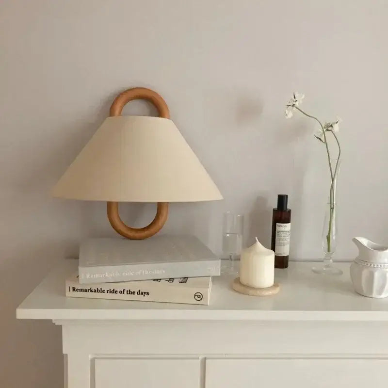 Beige fabric shade wabi-sabi wall lamp with beech wood ring base for bedroom lighting solution