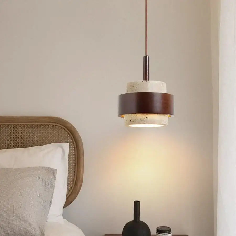 Wabi sabi beige and brown pendant light fixture with textured concrete and wooden bands for living room lighting