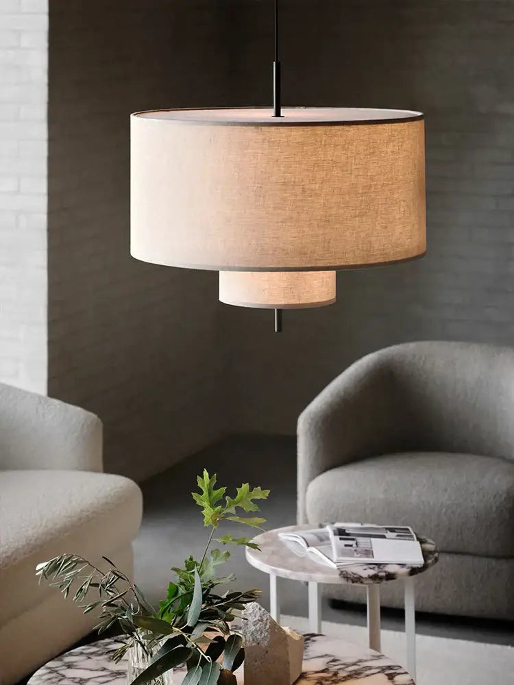 Beige linen drum pendant lamp with minimalist black metal frame perfect for bohemia wabi sabi pendant lamps decorbites bohemia wabi