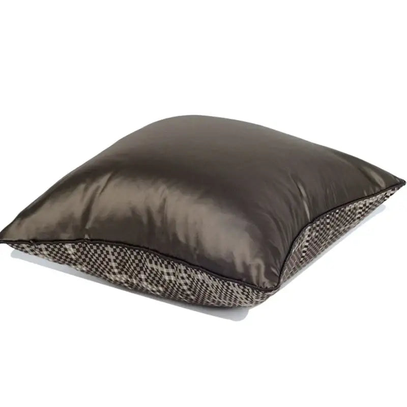 A sleek dark gray satin pillow cover with black and white houndstooth pattern for wabi sabi decorbites brown geometric style