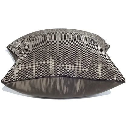 Wabi sabi black and silver geometric pillow cover with woven checkered pattern and dark gray leather trim decorbites brown geometric