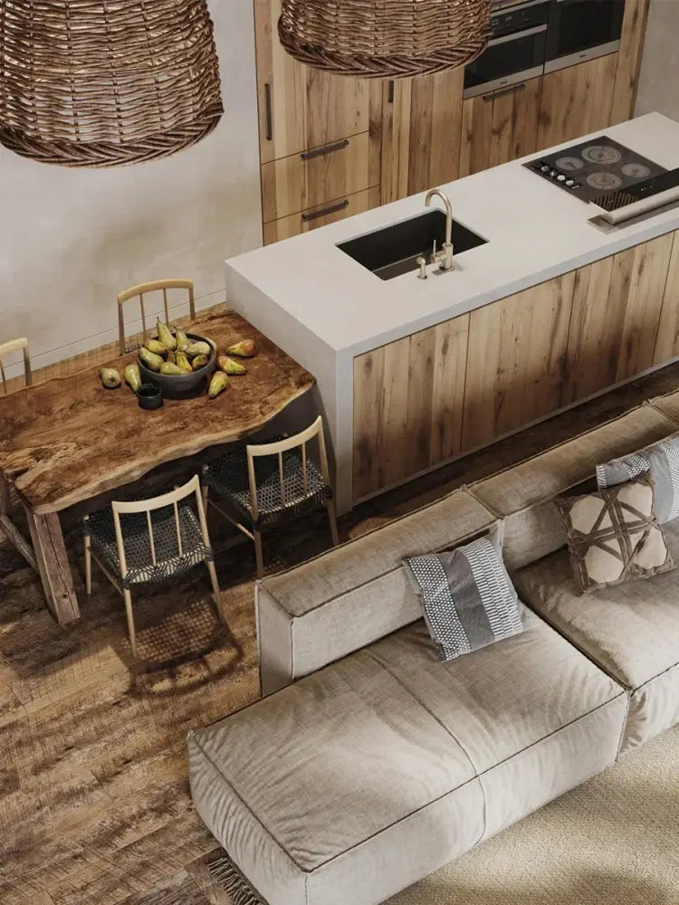 A rustic wooden dining table with a live edge beneath a wabi sabi brown handmade rattan seaside pendant lamp decorbites handmade rattan