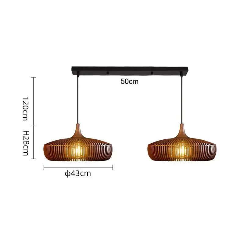 Pair of warm-toned brown ribbed wood pendant lights with black metal fixtures as a stylish living room light source