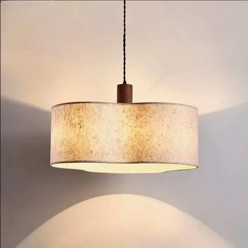 Warm-toned decorbites cream wabi-sabi chandelier lamp with textured fabric shade and dark wood accent for bedroom decor