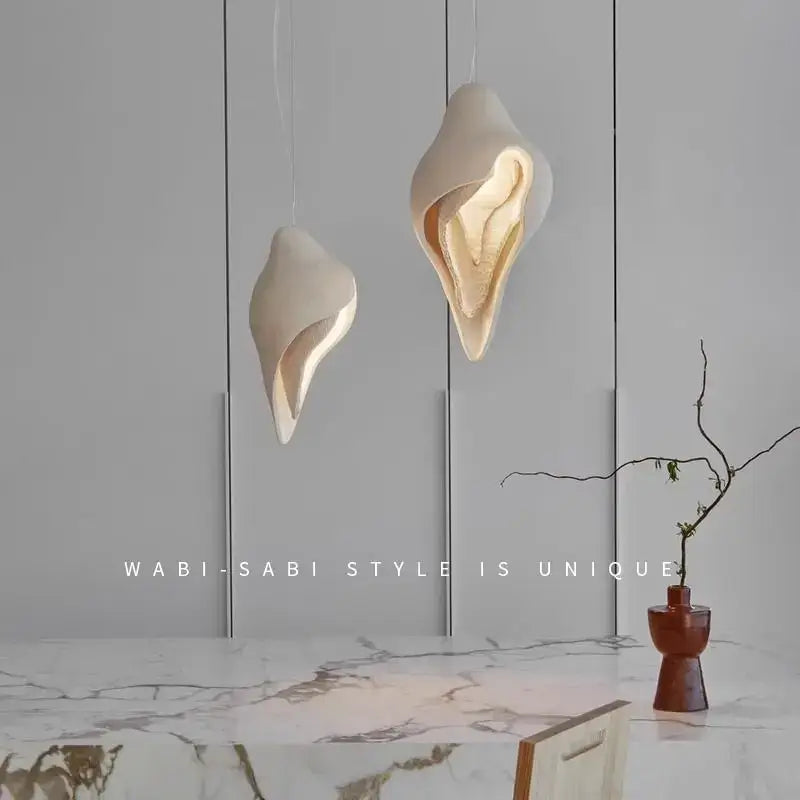 Wabi sabi cream gypsum conch pendant lamp with shell shape warm glow and gold accents for living room decorbites gypsum conch pendant