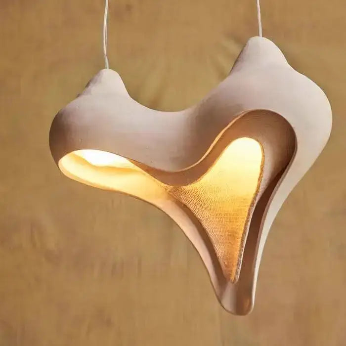 Wabi sabi cream gypsum conch pendant lamp with beige exterior and warm gold interior for living room decorbites gypsum conch pendant