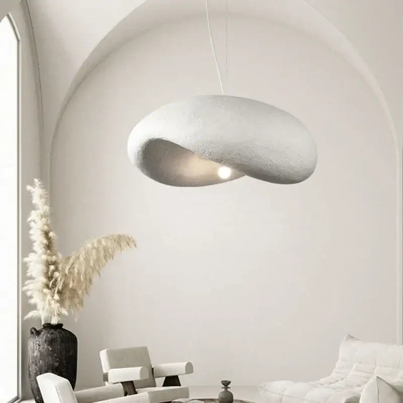 A sleek off-white wabi sabi cream style led chandelier with a smooth organic shape for living room decorbites cream style