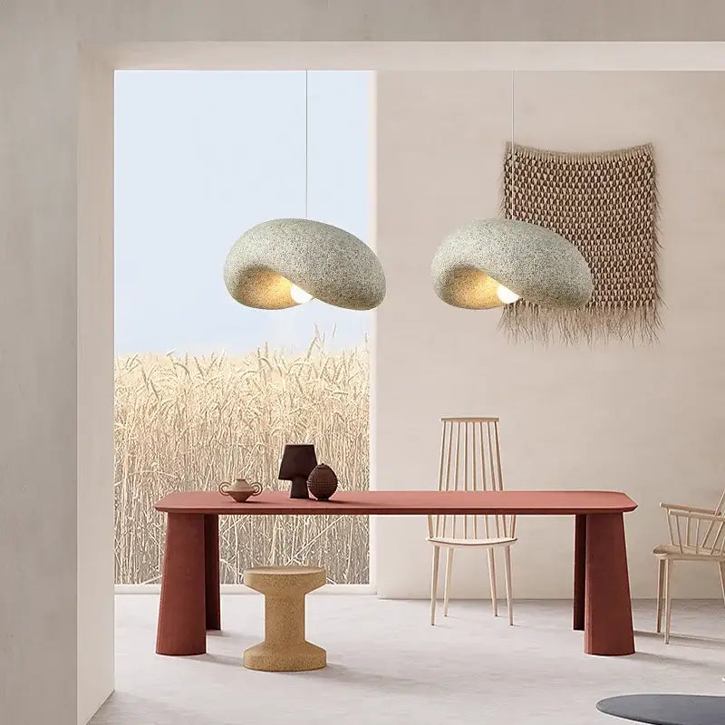 Two cream style led pendant lights with textured speckled gray finish and organic shapes for living room decorbites style led chandelier