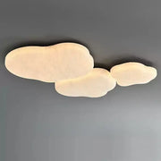 Modern cloud-shaped ceiling light fixture in decorbites french cream silk with soft warm glow for bedroom decor