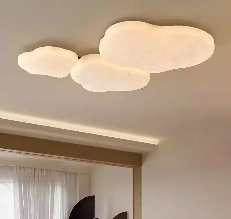 Soft off-white cloud-shaped ceiling light fixture with smooth matte finish wabi-sabi french cream silk decorbites french cream
