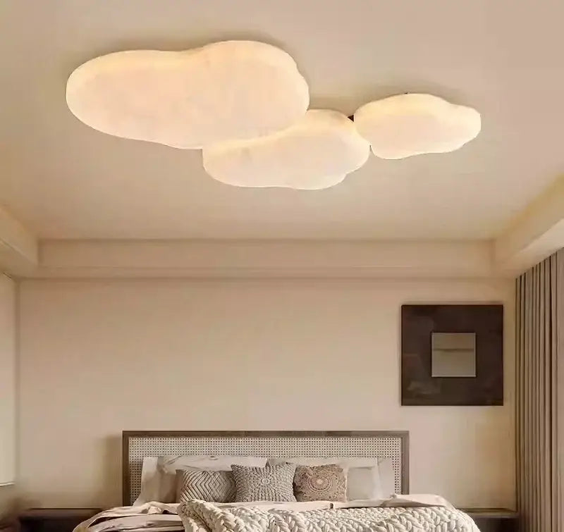 Soft off-white cloud-shaped ceiling light fixture with french cream silk finish by decorbites for bedroom decor
