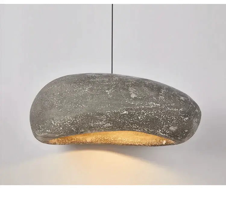 Gray concrete wabi sabi decorbites handmade polystyrene indoor pendant light with warm gold accent for dining room