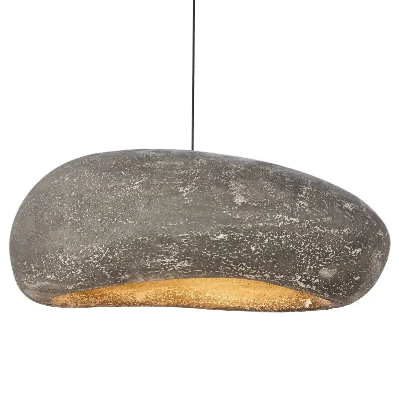 A sleek gray stone textured decorbites handmade polystyrene indoor pendant light with warm gold interior lining