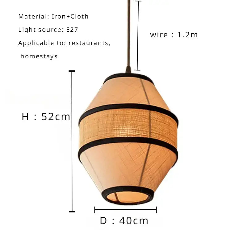 A warm-toned conical wabi sabi pendant lamp with woven fabric shade and black trim bands for dining room decorbites colored wabi