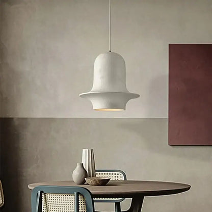 A sleek white ceramic bell-shaped pendant light from decorbites black wabi-sabi industrial chandelier collection