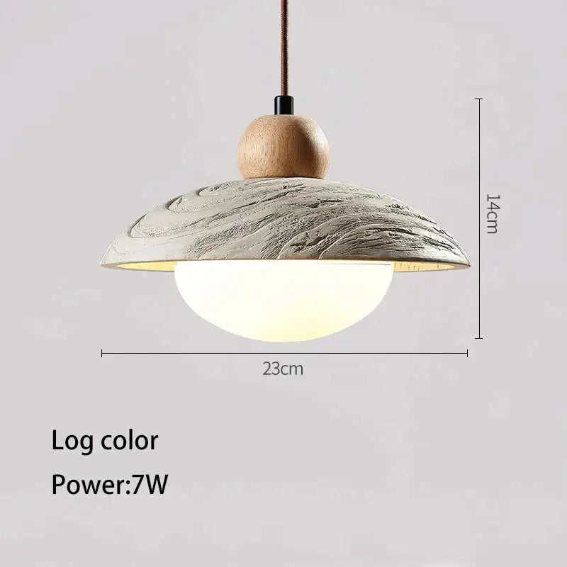 A modern wabi-sabi off-white cement pendant chandelier with a textured log-colored ceramic shade and natural wood top