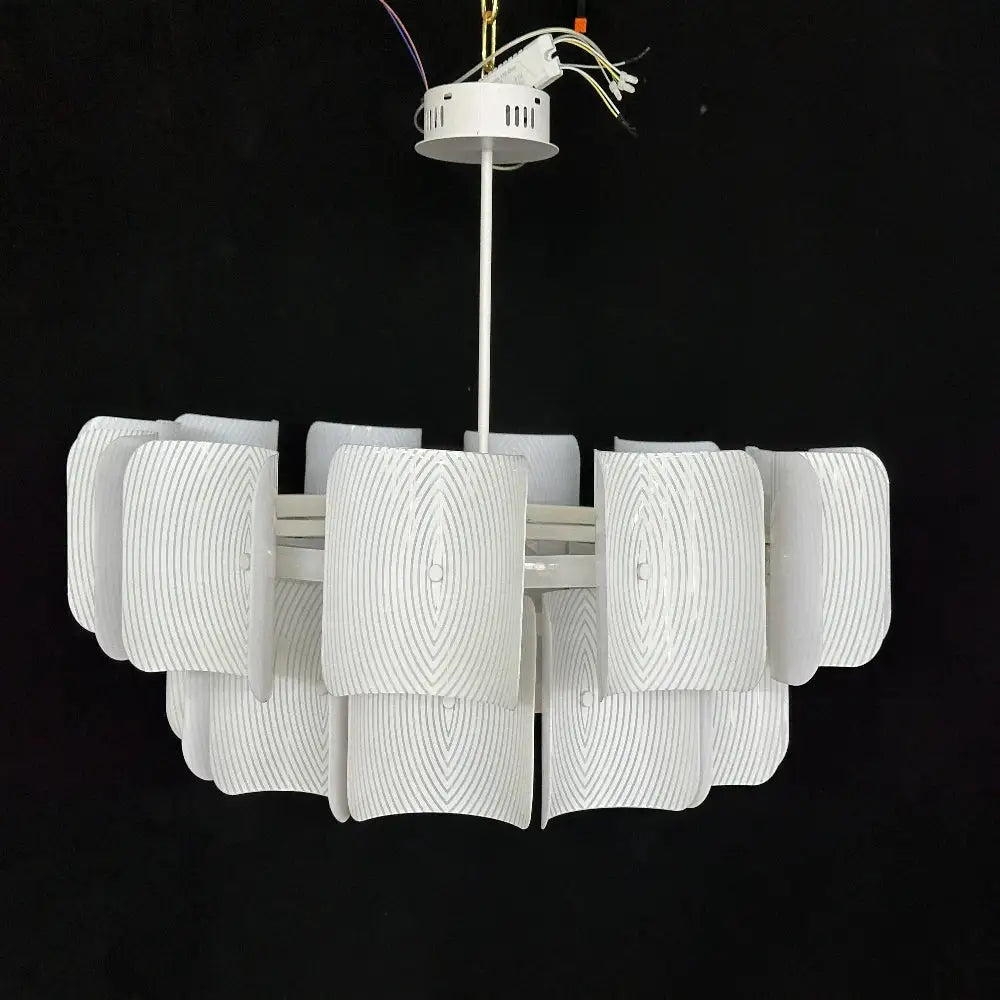 Wabi sabi off-white pendant light with layered ribbed glass shades and painted iron finish for dining room