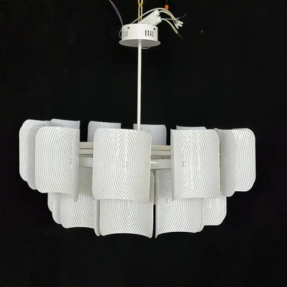 Wabi sabi off-white pendant light with layered ribbed glass shades and painted iron finish for dining room