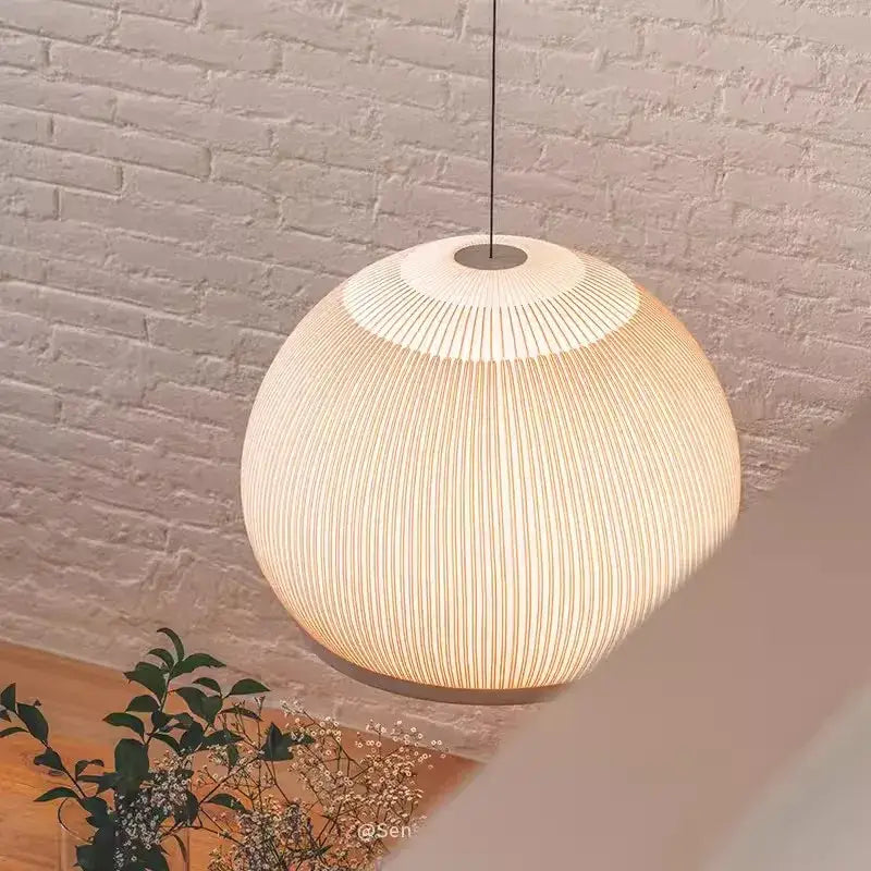 Warmly glowing wabi-sabi ribbed fabric light luxury chandelier in off-white for bedroom decorbites light luxury use