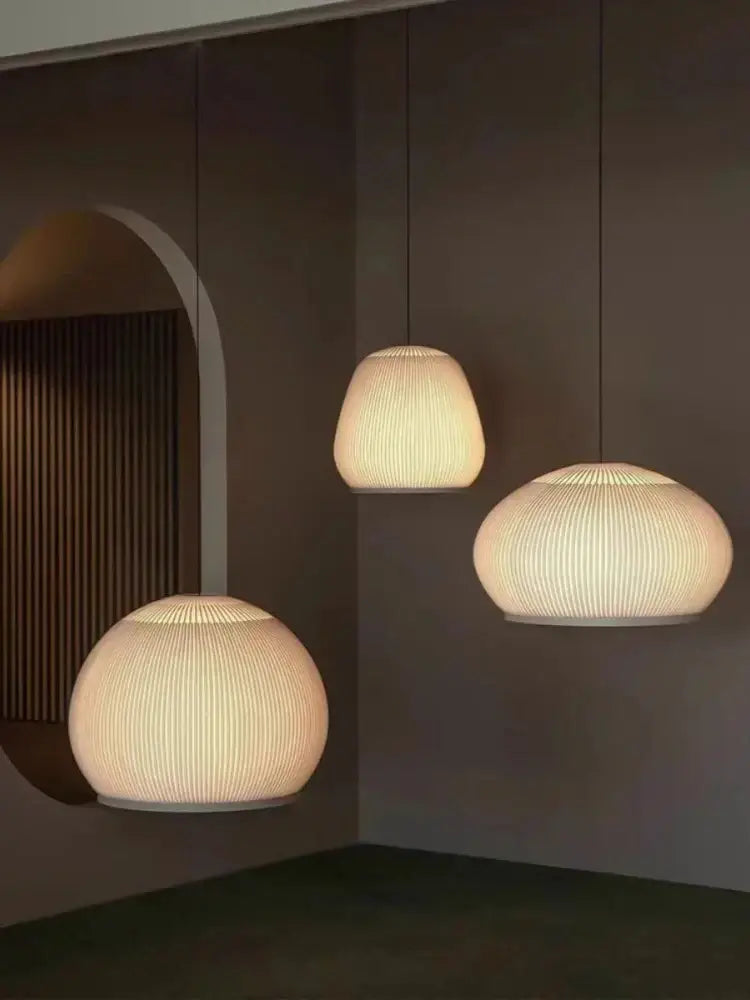 Three cream-colored wabi-sabi ribbed fabric decorbites chandelier pendant lights for bedroom light luxury decorbites light luxury