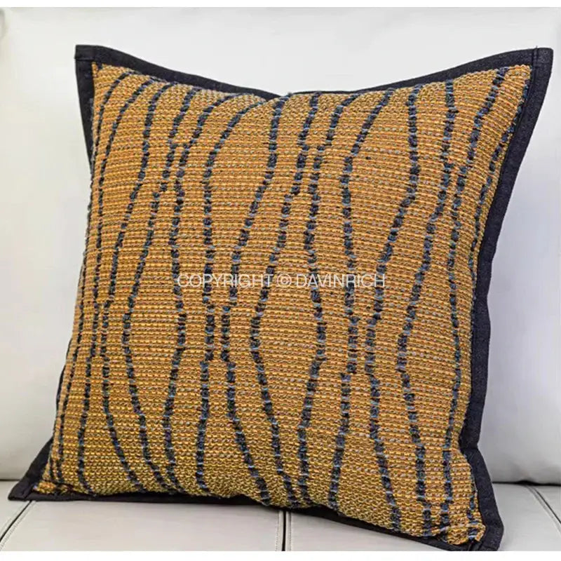 Square throw pillow case with textured woven pattern in golden yellow and dark navy blue for living room decor