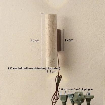 A cylindrical wabi sabi terrazzo and wood led wall light with textured beige surface and dark bronze bracket for bedroom decorbites led wall