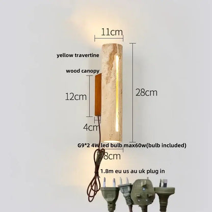 A modern wabi sabi terrazzo and wood led wall light with a yellow travertine cylindrical body and wooden canopy