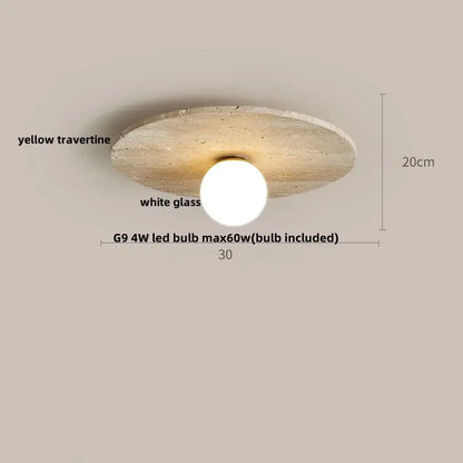 A modern ceiling lamp with a circular yellow travertine disc and white glass globe acrylic led ceiling light