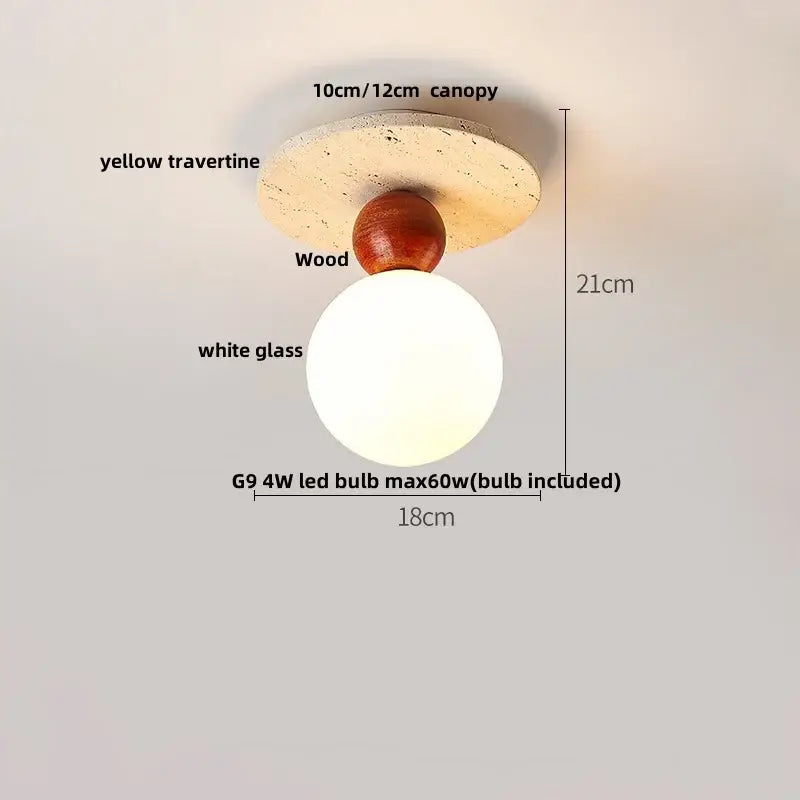 A ceiling lamp with yellow travertine wood canopy and frosted glass globe in the wabi sabi decorbites acrylic led style