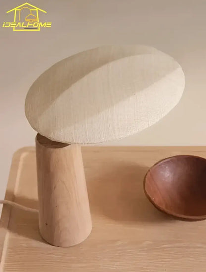 Beige linen-textured mushroom-shaped vintage wooden desk lamp with natural wood base for bedroom use