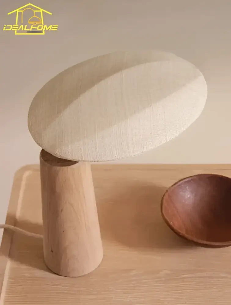 Beige linen-textured mushroom-shaped vintage wooden desk lamp with natural wood base for bedroom use