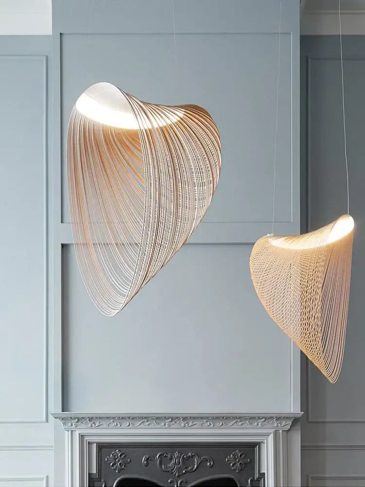 Two elegant warm-toned yellow iron pendant lights with woven shell design for dining room cord pendant installation