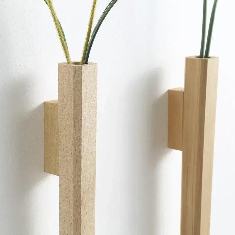 Minimalist light-colored wooden wall hanging vase with sleek rectangular design and subtle wood grain texture for home decor