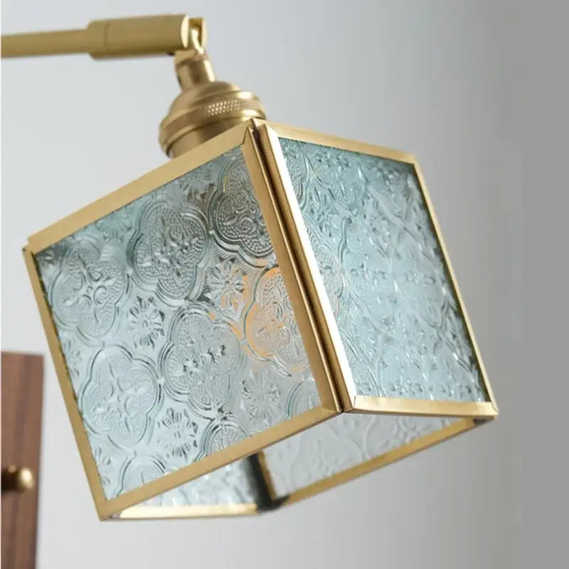 Walnut and brass cube glass led wall sconce with frosted floral embossed panels for bedroom mirror light decorbites cube glass