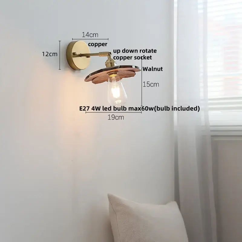 Walnut and brass wall sconce with copper and walnut finish featuring a vintage industrial design and pull chain switch