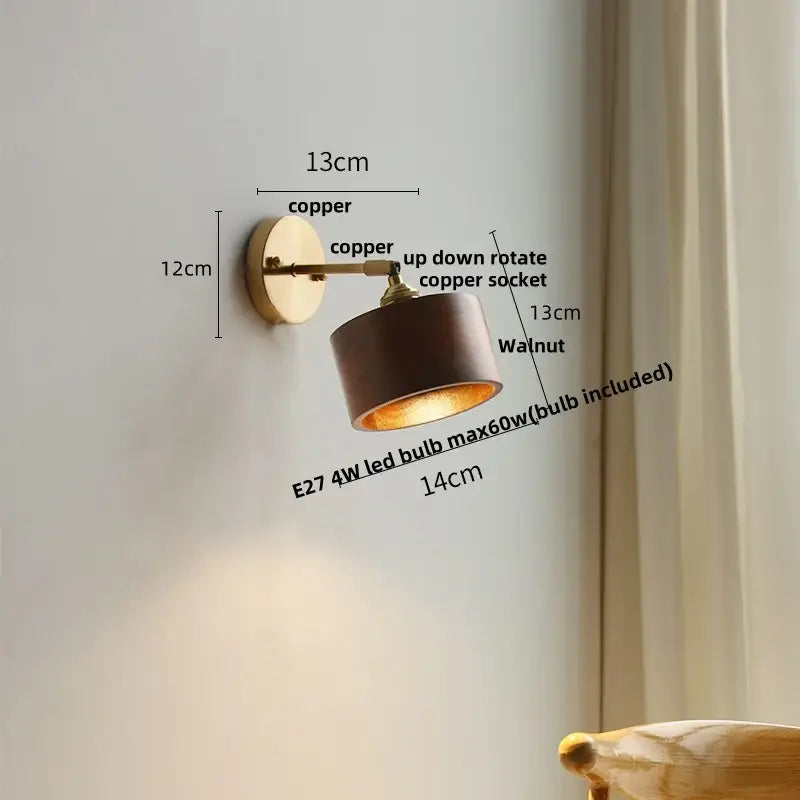 Walnut and brass wall sconce with copper finish walnut shade and adjustable rotation featuring a pull chain switch
