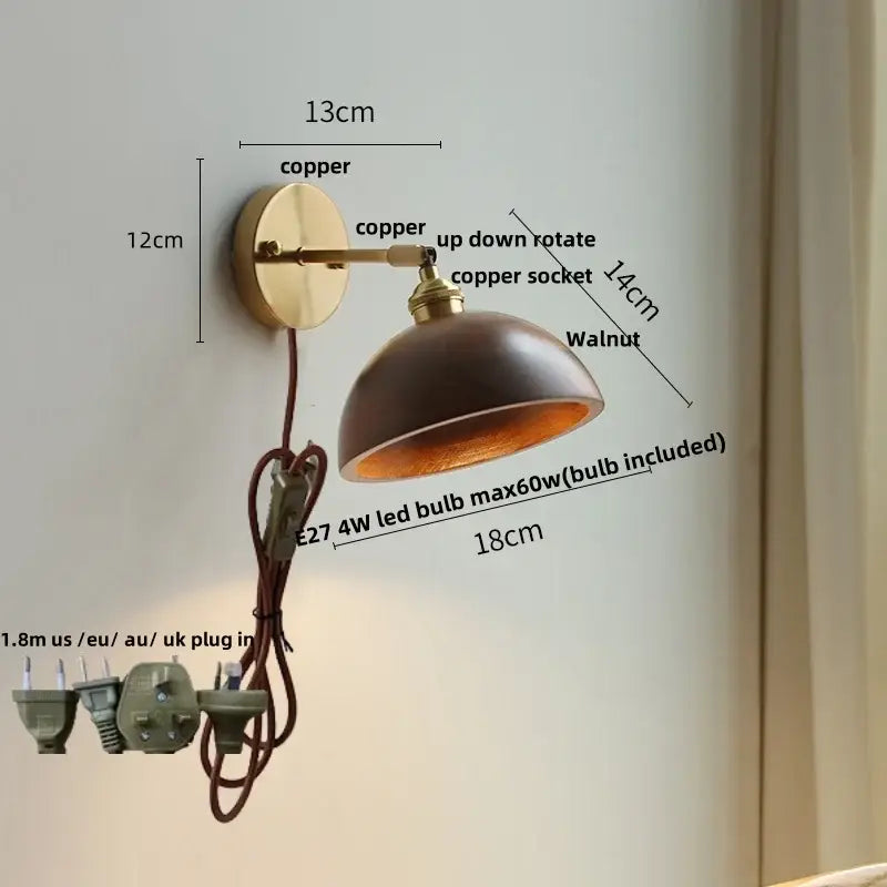 Walnut and brass wall sconce with copper finish, dark walnut shade, adjustable arm, and pull chain switch for bedroom lighting