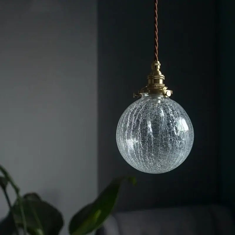 Clear crackled glass led pendant light with warm brass fixture and twisted brown cord for kitchen dining room decorbites cracked glass